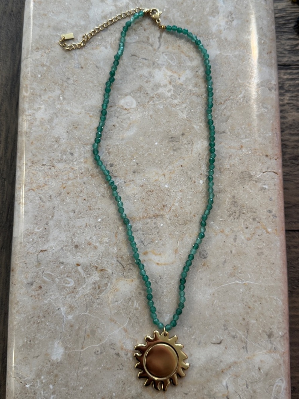Gold Sun Pendant Necklace with Green Beaded Chain